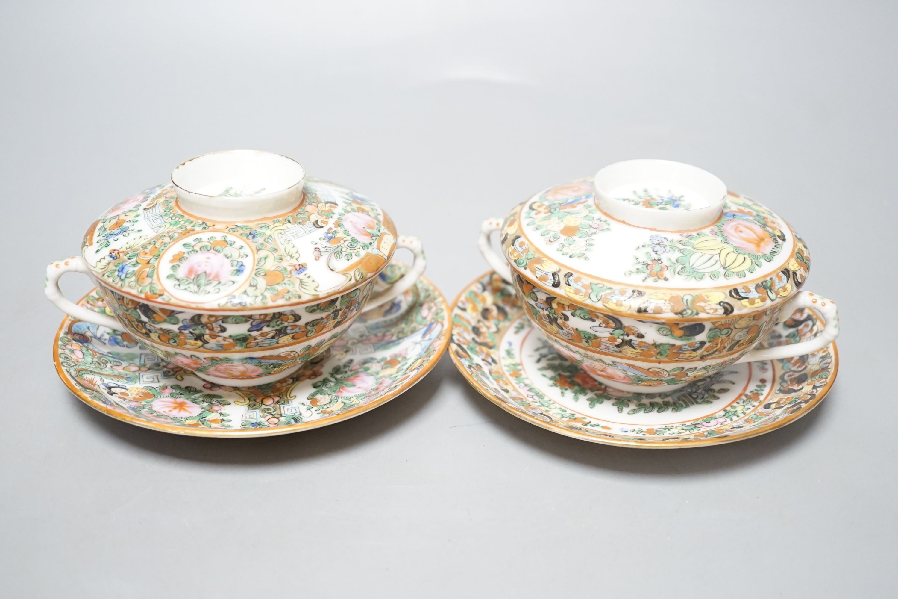 A Chinese porcelain tea bowl and stand and a pair of Cantonese bowls, covers and stands